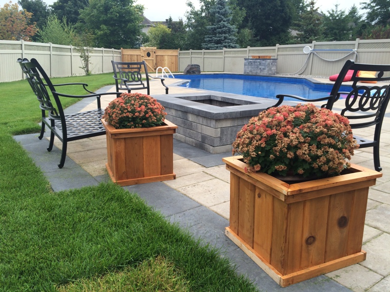 wooden planters by the pool