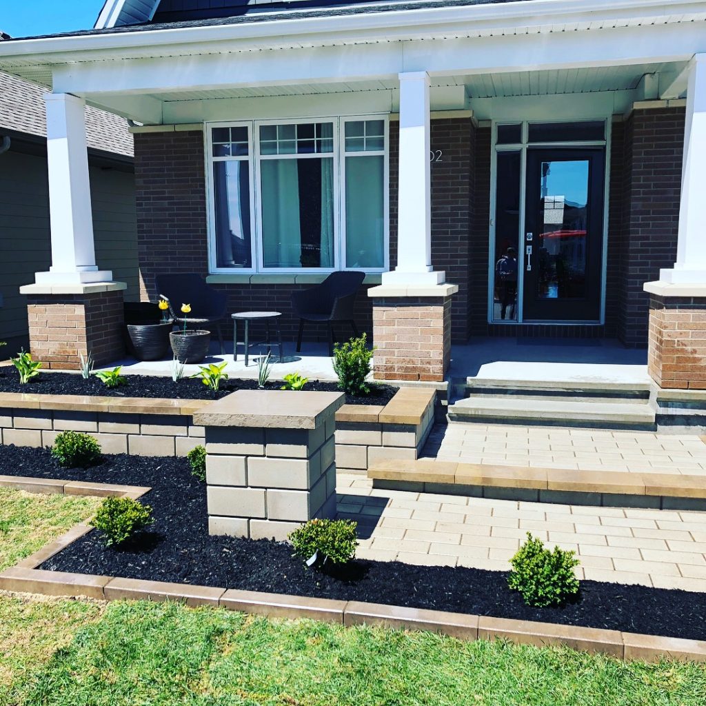 front stone porch with garden