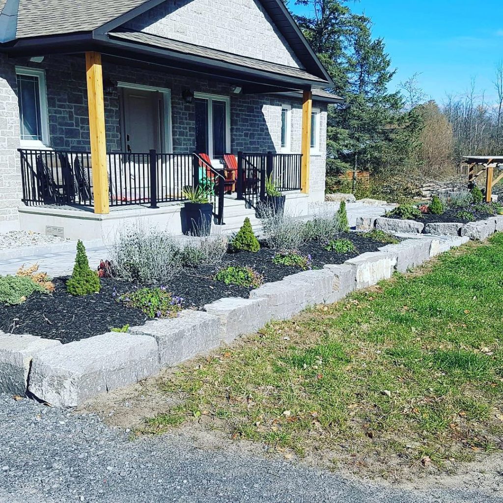 front porch with stone garden